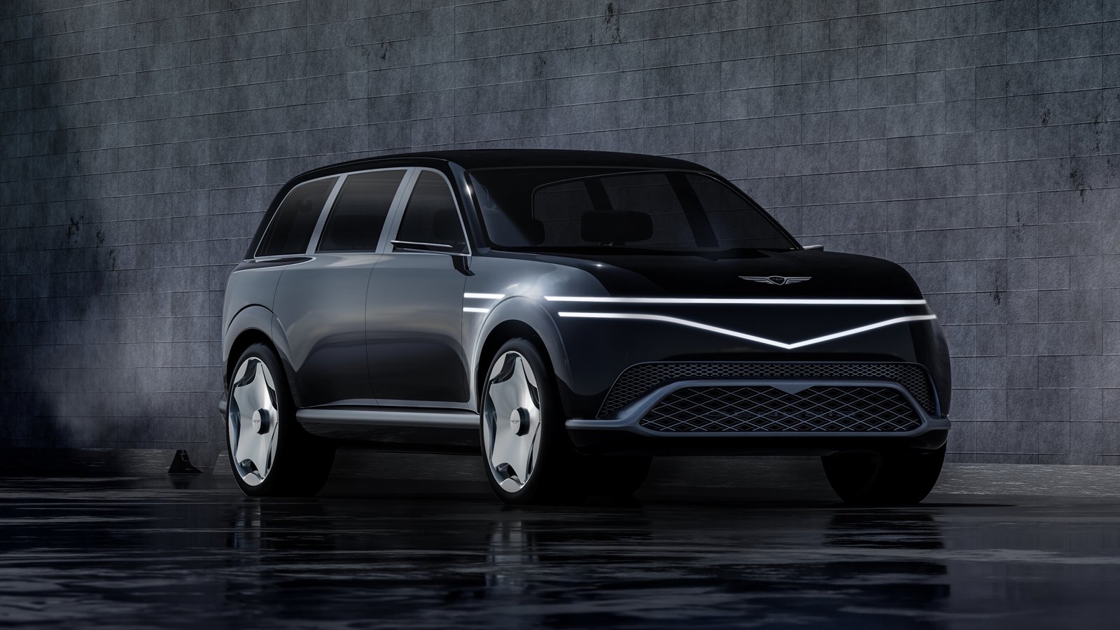Concept Genesis Neolun, grand SUV électrique gris foncé vu de trois quarts avant en studio