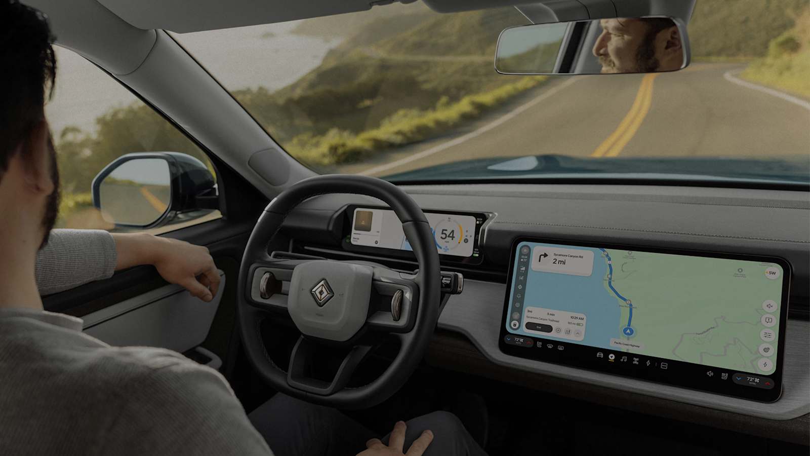 Intérieur du Rivian R2 avec écran central de navigation et volant